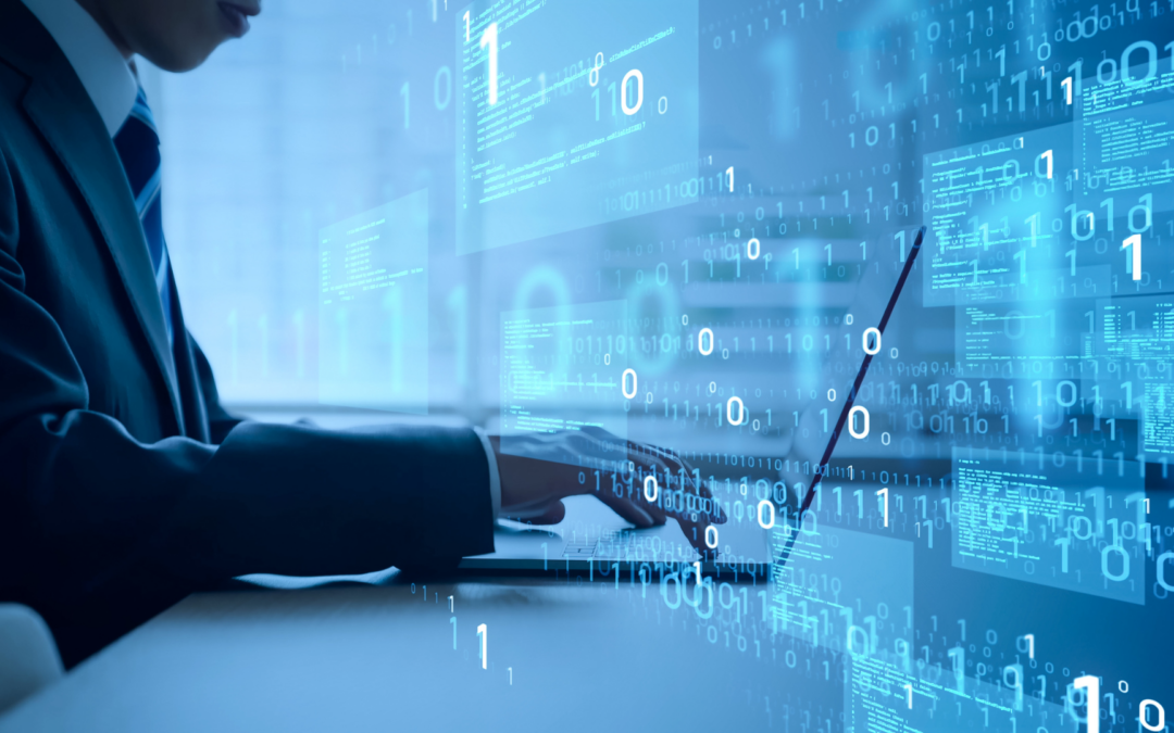 Businessperson typing on a laptop with blue holographic code and binary data overlays.
